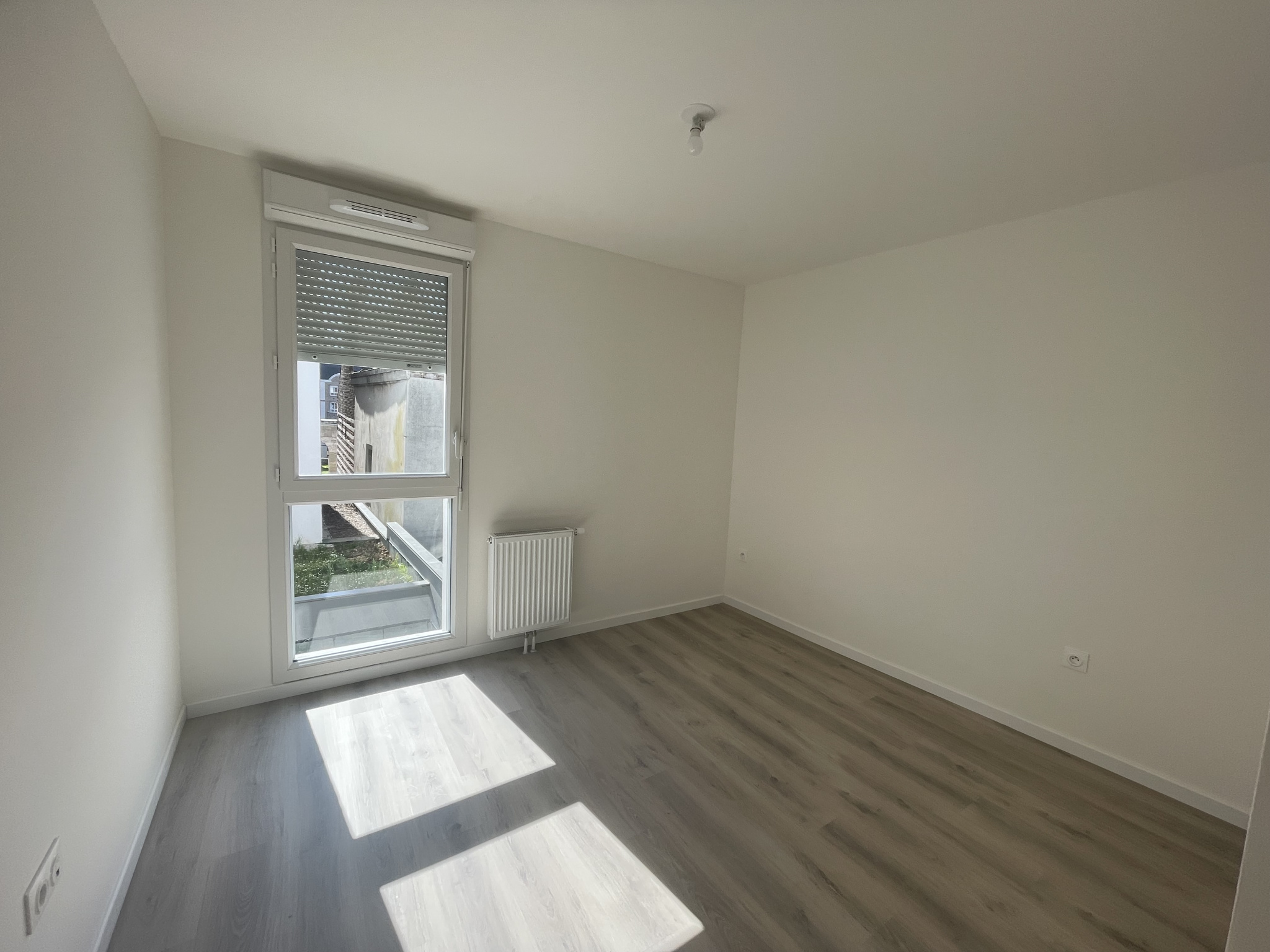 Immo80 – L'immobilier à Amiens et dans la Somme-AMIENS CENTRE VILLE : BEL APPARTEMENT NEUF de 69 m2 avec loggia de 12 m2 et parking en sous-sol
