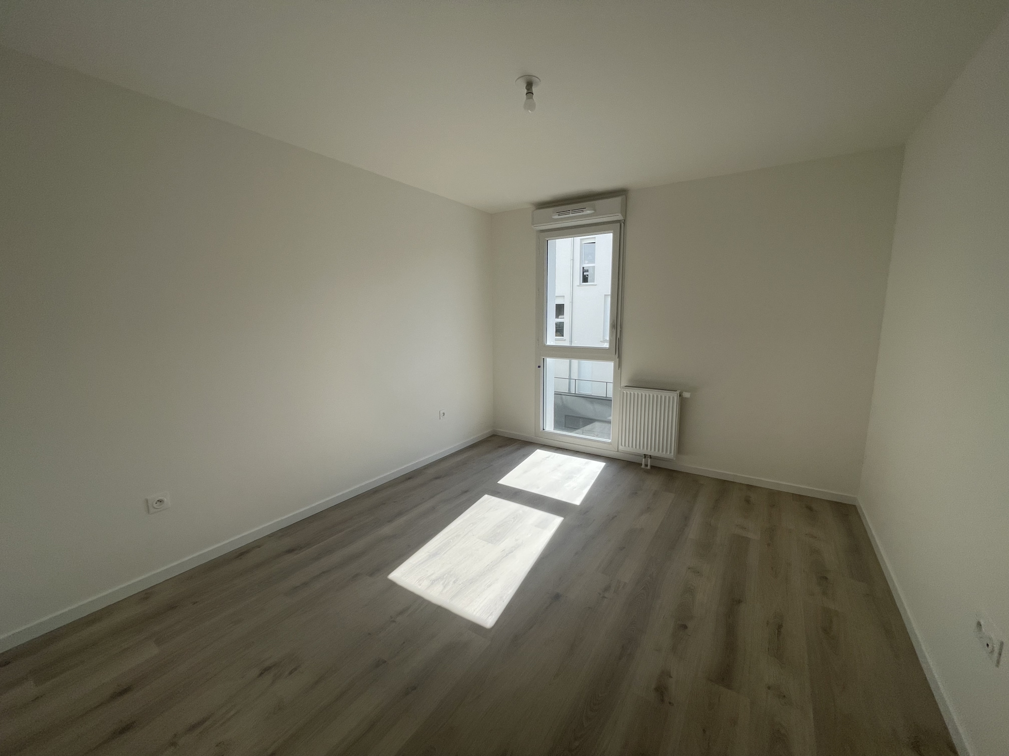 Immo80 – L'immobilier à Amiens et dans la Somme-AMIENS CENTRE VILLE : BEL APPARTEMENT NEUF de 69 m2 avec loggia de 12 m2 et parking en sous-sol