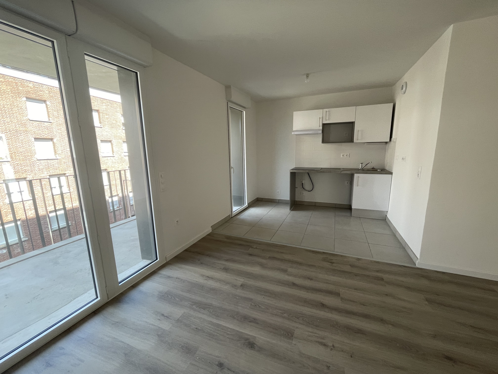 Immo80 – L'immobilier à Amiens et dans la Somme-AMIENS CENTRE VILLE : BEL APPARTEMENT NEUF de 69 m2 avec loggia de 12 m2 et parking en sous-sol