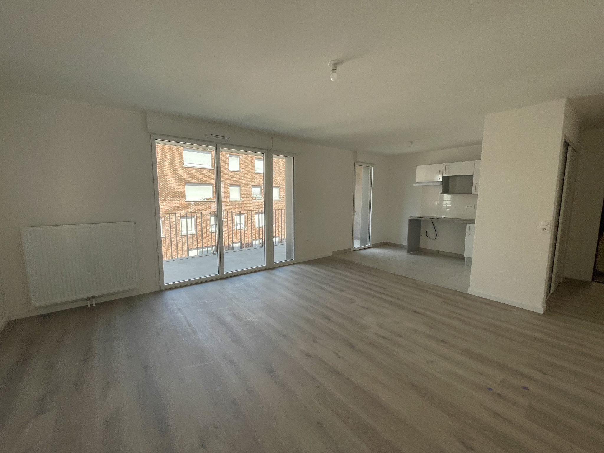 Immo80 – L'immobilier à Amiens et dans la Somme-AMIENS CENTRE VILLE : BEL APPARTEMENT NEUF de 69 m2 avec loggia de 12 m2 et parking en sous-sol