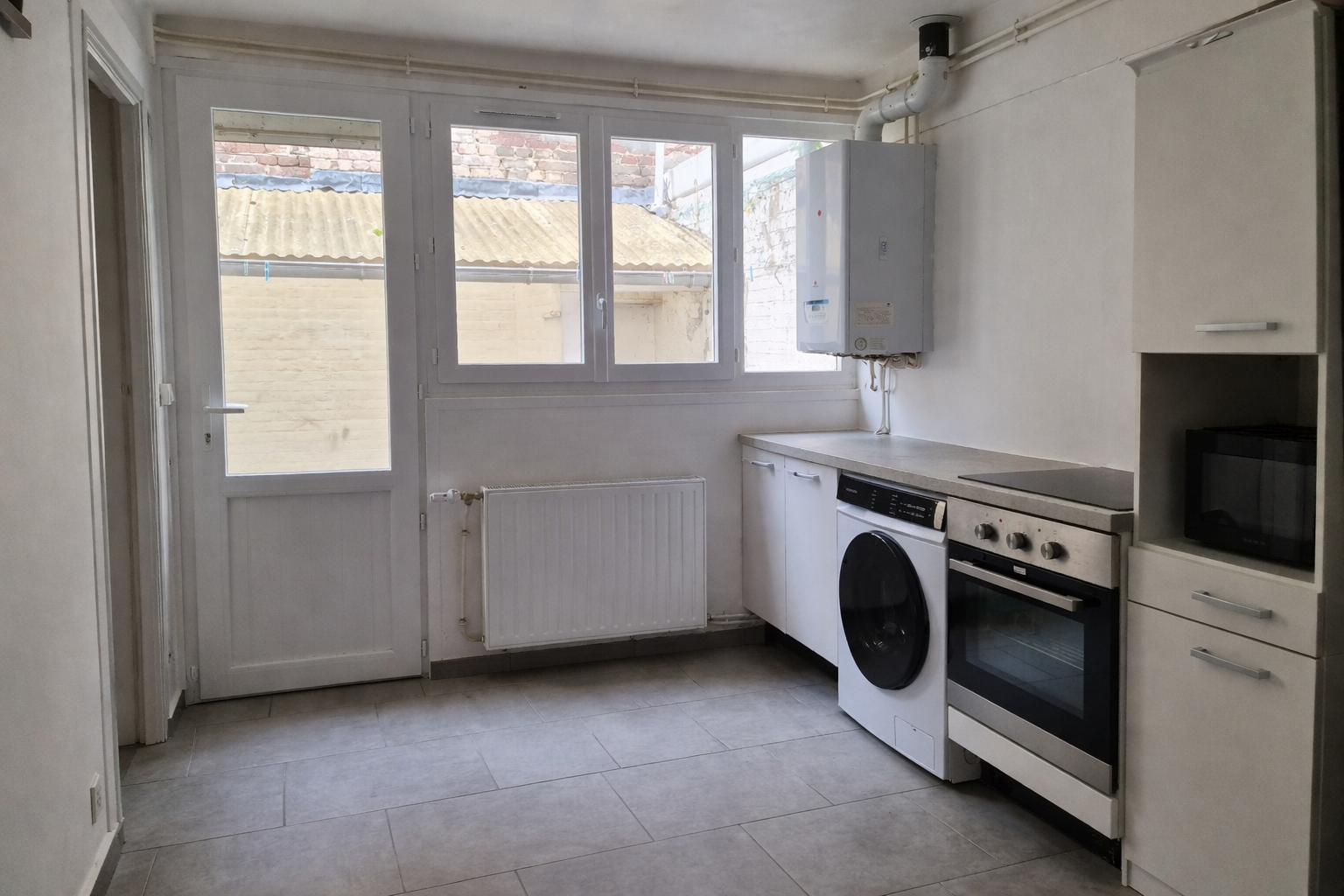 Immo80 – L'immobilier à Amiens et dans la Somme-AMIENS ST PIERRE – proximité du Bd de Beauvillé : MAISON AMIENOISE avec cour